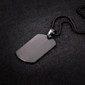 Detailed view of a matte black stainless steel dog tag pendant and matching box chain - Pendant with Ball Chain / Black