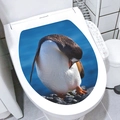 Detail of waterproof toilet lid sticker with a realistic penguin on blue water surface - Snowy Penguin (M-43)