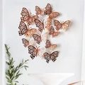 Detailansicht der 3D-Wandtattoos Schmetterling in Roségold mit filigranem Laserschnitt-Muster - Roségold