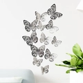 Detaillierte 3D-Hohl-Schmetterling Wandaufkleber mit silbernen Laserschnitt-Blumenmustern - Silber