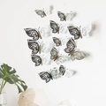 Dettaglio di 12 farfalle 3D decorative argentate con intaglio metallico per pareti - Argento