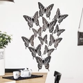 Detailed view of 12pcs black 3D hollow butterfly wall stickers in a modern home interior - Set of Four Each Large Medium Small / Black