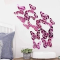 Close-up of 3D purple butterfly wall stickers with floral hollow patterns for home decor - Rose Red