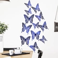 Detailed 3D blue hollow butterfly wall stickers with laser-cut patterns on a white wall - Set of Four Each Large Medium Small / Blue