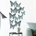 3D hollow teal butterfly wall stickers with laser-cut patterns on a white background - Set of Four Each Large Medium Small / Green
