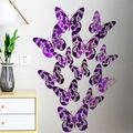 Detail of 3D purple hollow-out paper butterflies with lace patterns on wall - Purple