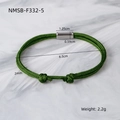 Detailed macro view of 2mm green woven cord bracelet with silver magnetic buckle - 18K Gold / Green