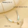 Detail of 18k gold ocean style necklace with blue beads and shell pendant - Blue Shell Necklace