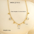 Detail view of gold bead anklet with clear crystal pendants and size measurements - White