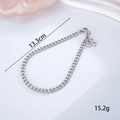 Silver stainless steel star chain bag charm with bow pendant and lobster clasp detail - Chain + Bowtie Chain