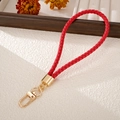 Handgefertigte rote geflochtene PU-Leder Handgelenkschlaufe mit goldenem Karabiner - Rot