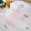 Detail view of pink marble acetate mini comb with dimensions 10.3cm and 4.5cm - Oval Comb (K5958)