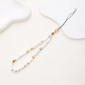Detail of handmade LOVE beaded phone strap with white heishi clay beads and gold accents - White Clay LOVE Style (K815)