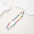 Detail der handgefertigten bunten Heishi-Perlen-Handykette mit LOVE-Buchstaben und Smileys - Lila Ton Smiley Stil (K1083)
