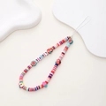 Detail einer bunten Handy-Handschlaufe aus Fimo mit LOVE-Perlen und kleinen Fruchtanhängern - Ton Obst Buchstabe Stil (K812)