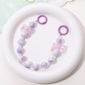 Detail of purple iridescent beaded strap with resin bows and metallic round rings - Purple Two-Tone Bowknot Style (K306)