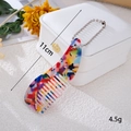 Close-up of leopard print acetate mini comb pendant with size and weight detail - Horn Comb (K5964)