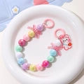 Colorful iridescent beaded keychain with macaron pearls and a cute white bunny charm - Colorful
