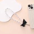 Acrylic bead phone strap with white pearls and black bowknot on wavy phone case - K508 Crystal Bow Phone Chain