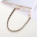 Close-up of black leather and gold metal braided chain strap with lobster clasps - Hand Chain / Black Style (K1732)