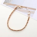 Detail of gold metal and brown leather woven chain strap with lobster clasps - Tan