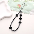 Short phone wrist strap with black and white striped beads and black heart accents - K896 Black Heart Phone Chain