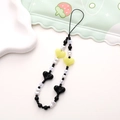 Detail of handmade beaded phone strap with colorful heart charms and striped beads on a tray - K876 Heart Phone Chain (Yellow + Black)