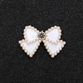White enamel bow alloy charm with gold edge, large center rhinestone and pearls - Gold Base White Bow