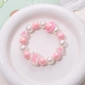 Dettaglio del cinturino per telefono con perline, charm Mahjong rosa e cuori - Ciondolo / Rosa