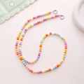 Detail showing colorful acrylic beads on a phone strap with silver metal ring clasps - K1058 Iridescent Acrylic Bead Crossbody Chain