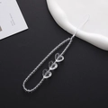 Detailed view of clear beaded phone strap with multi-faceted transparent heart-shaped beads - K1034 Transparent Beads Style