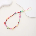 Rainbow fruit clay bead phone wrist strap with strawberry and evil eye accents - Clay Fruit Style (K811)