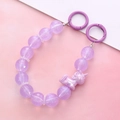 Detail of purple iridescent beaded strap with a unicorn charm and metal spring rings - Unicorn Hand Chain / Purple (K2037)