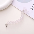 Detail der rosa mattierten Perlen und des Bärenanhängers für DIY-Handyketten - Bären-Charm-Stil / Lila Armband