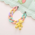 Detail of colorful matte acrylic phone chain with cute yellow teddy bear charm and metal clasp - Bracelet Style / Yellow Bear Wristlet with Screws (K123)