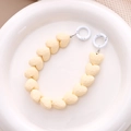 Creamy yellow faceted heart beaded chain with white spring rings for phone and bags - White