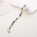 Dettaglio del cinturino per cellulare con perline colorate e ciondolo a cuore - Catena Cellulare Perline Effetto Vetro (5312505211821) / Stile Occhio di Vetro K550