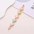 Colorful acrylic heart phone strap with iridescent charms and golden magnetic clasp - Bracelet Style / Rainbow