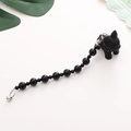 Close-up of black beaded phone strap featuring a cute French Bulldog charm and metal clasp - Bead / Black