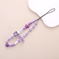 Detail of purple beaded phone strap featuring bow, heart candy, and star charms - Purple Bow Beaded (K1059) / Purple Candy Phone Chain