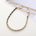 Detail of light gold metal chain woven with dark green leather and lobster clasps - Dark Green