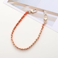 Detail of woven orange leather and gold metal chain strap with lobster clasps - Orange