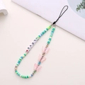 Detail of DIY clay evil eye phone charm with LOVE letter beads and butterfly pendant - K787 Green Style