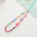 Detailed shot of colorful acrylic bear beads and pearl charms on a phone wrist strap - Bear Style (K987)