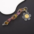 Detail of gradient acrylic phone chain with glitter sunflower and yellow smiley face - Yellow Chain Sunflower (K575)
