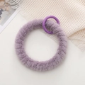 Plush purple O-ring keychain accessory with fuzzy texture and matching metal clip - Purple
