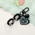 Portachiavi con cuore nero e catena in acrilico con campanellino per borse e auto - Nero