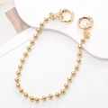 Détail de la chaîne à billes en métal doré 6mm avec fermoirs à ressort ronds accessoires - Chaîne à Perles 6mm Main / Or (K433)