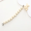 Matte cream acrylic beaded phone charm featuring a cute bear figurine and silver metal clasp - Coffee Bear Style (K681)