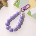 Close-up of purple iridescent beaded keychain with metallic lobster clasp and silver spacers - Mermaid Beaded Pendant (K1991) / Purple